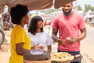 people buying roasted plantain