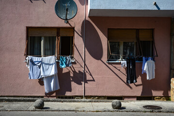 Drying clothes from windows.