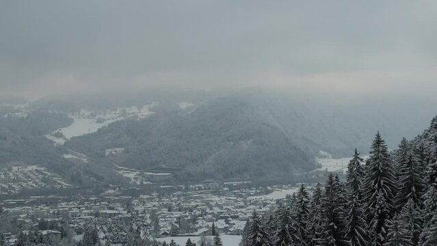 fog in the mountains in austria, town bludenz