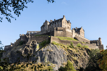 Fototapeta na wymiar Edinburgh Castle is a historic castle in Edinburgh, Scotland. It stands on Castle Rock