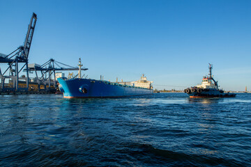 bulk carrier vessel is sailing in the port area. Bulk carrier after accident in bow