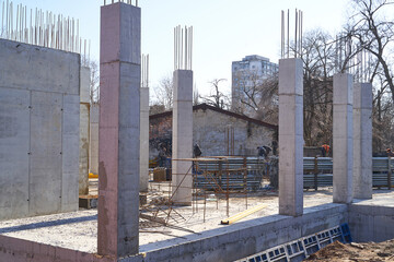 Construction site. High rise Building under construction. Construction of high-rise residential building