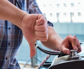 Repairman repairing broken color printer