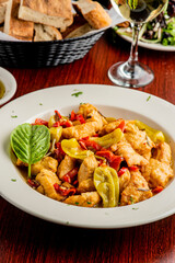 Italian Chicken. Chicken Cacciatore. Italian cuisine, alla cacciatora refers to a meal prepared 