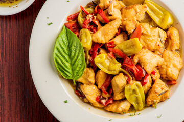 Italian Chicken. Chicken Cacciatore. Italian cuisine, alla cacciatora refers to a meal prepared 