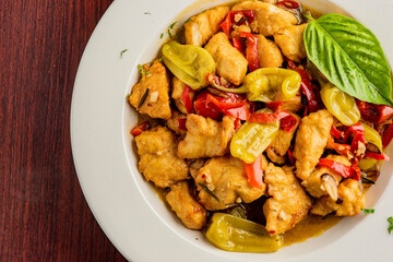 Italian Chicken. Chicken Cacciatore. Italian cuisine, alla cacciatora refers to a meal prepared 