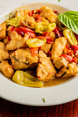 Italian Chicken. Chicken Cacciatore. Italian cuisine, alla cacciatora refers to a meal prepared 