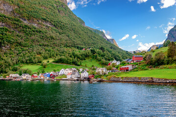 Undredal seen from the sea. It is a picturesque tiny village that sits along the Aurlandsfjord, Vestland county, Norway and it is a popular tourist destination