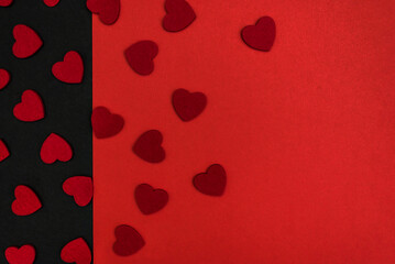 Black and red background decorated with red hearts, a banner for discounts or congratulations