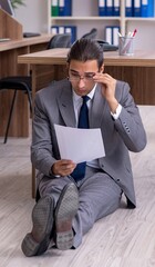 Unhappy male businessman in the office