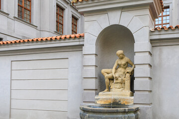 Ancient fountains with sculptures in the architecture of the city. Historical and cultural heritage Background