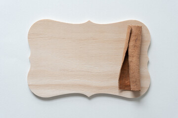 wooden board and cinnamon stick