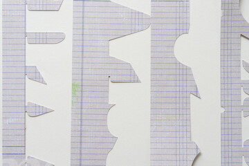 abstract background with cut paper stencils (alphabetical)