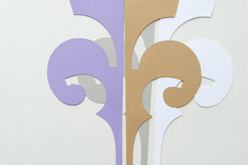 purple, brown, silver, and white elegant decor shapes on blank paper