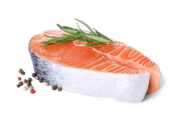 Fresh raw salmon steak with rosemary and peppercorns on white background