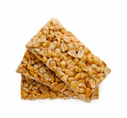 Tasty peanut bars (kozinaki) isolated on white, top view
