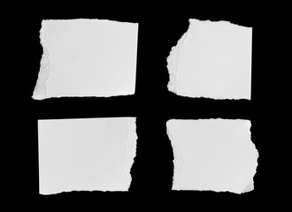 Set of White ripped piece of paper isolated on black background with clipping path.