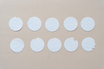 white paper circles with floral design