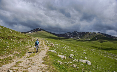 Fototapeta na wymiar Trekking the superb alpine Keskenkija Trek, Jyrgalan, Kyrgyzstan