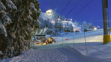 Ski lift on Grouse Mountain, BC, at night.