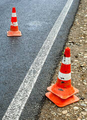Traffic cones on the road.