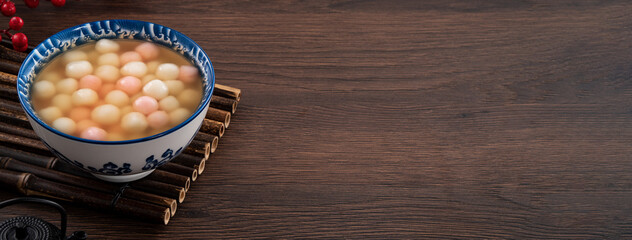 Red and white tangyuan with syrup soup.