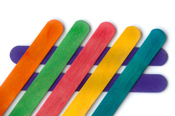 Top view of colored wooden sticks with customizable space for text. Copy space.