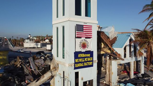 The Times Square area on Fort Myers Beach, FL is mostly reduced to rubble following the historic storm surge and winds from Hurricane Ian.
