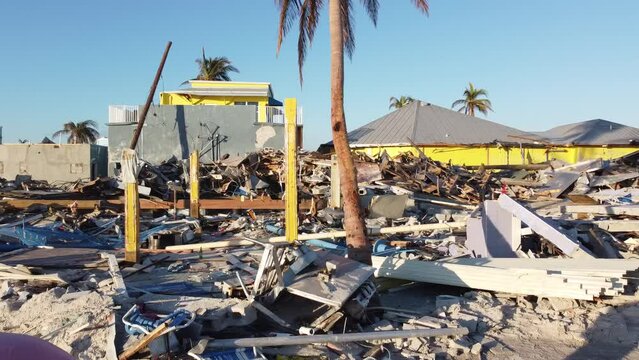 The Times Square area on Fort Myers Beach, FL is mostly reduced to rubble following the historic storm surge and winds from Hurricane Ian.