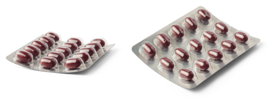 red iron tablets in blister packs, vitamin pills for improve iron level in blood, medical drug packages isolated, collection