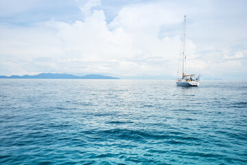 Obraz premium Sailing boat in a sea. Andaman Sea, Thailand. luxury summer adventure, active vacation in Southeast Asia.