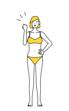 ガッツポーズをする下着姿の女性、脱毛やエステサロンのイメージ