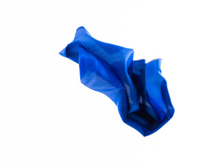 Dark blue silk flying on white background