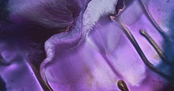 Purple paint wave in slow motion flow down. Amazing white-purple ink foam flowing background. Shiny ink mix background. Fluid backdrop. Acrylic move pattern texture. Dark pink liquid river color art