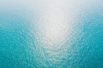 Top view of beautiful turquoise seawater surface texture background