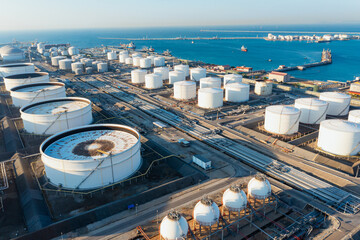 Aerial top view of White oil tank storage chemical petroleum petrochemical refinery product at oil...