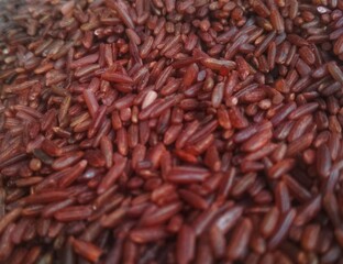 	
Portion of red Rice as detailed close-up shot for use as background image or as texture
