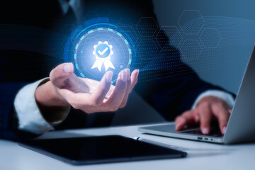 The hand of a businessman represents the quality assurance 5 star, guarantee, standards, ISO certification, and standardization concept.