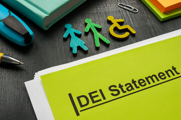 DEI statement documents and small colorful figurines.