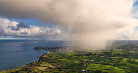 Light rain mizzle clouds over Ballygally on Co Antrim Northern Ireland