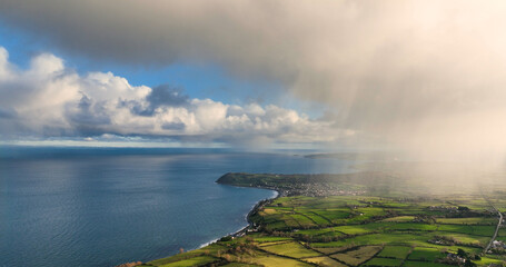 Light rain mizzle clouds over Ballygally on Co Antrim Northern Ireland