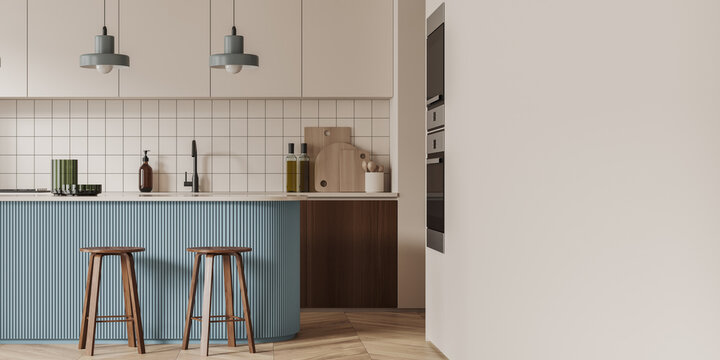 Light kitchen interior with bar countertop and seats, cooking area. Mockup wall