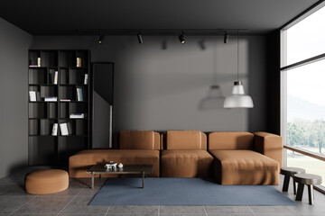 Grey chill interior with couch, shelf with decoration and window. Mockup wall