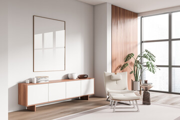 Corner view on bright living room interior with empty poster