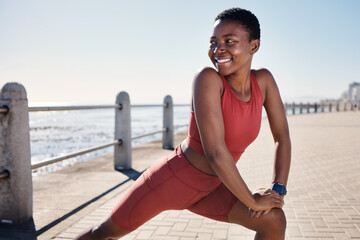 Stretching legs, happy and black woman training on the promenade for running, fitness exercise and...