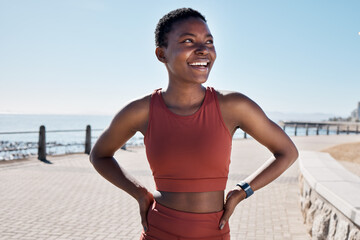 black woman, happy and thinking on beach sidewalk for fitness motivation, mental health and runner rest outdoor. African woman, athlete smiling and confident mindset vision by Cape Town seaside