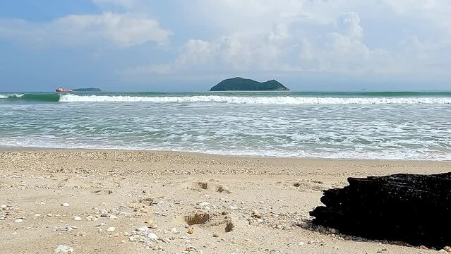 Seascape and and beach and wave on summer blue sky at Samila beach Songkhla Thailand