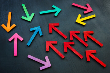 Trending and teambuilding concept. Red arrows with same direction and colorful with difference.