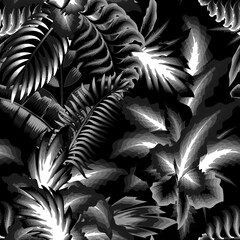 vintage rainforest illustration wallpaper seamles pattern with tropical leaves and plant foliage on dark background. jungle plants ornament. tropical background. nature wallpaper. interior decorative