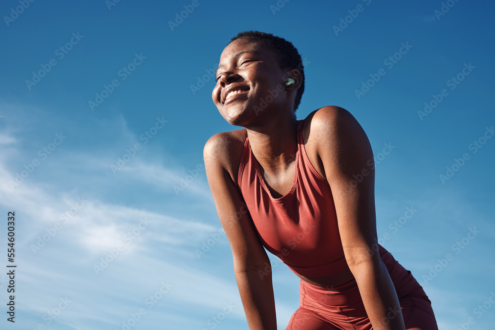 Wall mural Fitness, black woman and smile in relax for running, exercise or workout in the nature outdoors. Happy African American female runner smiling on a break from run, exercising and breathing fresh air